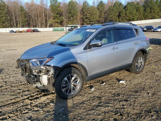 Image 1 of 2018 TOYOTA RAV4 HV LE 2018 with VIN JTMRJREV6JD187199