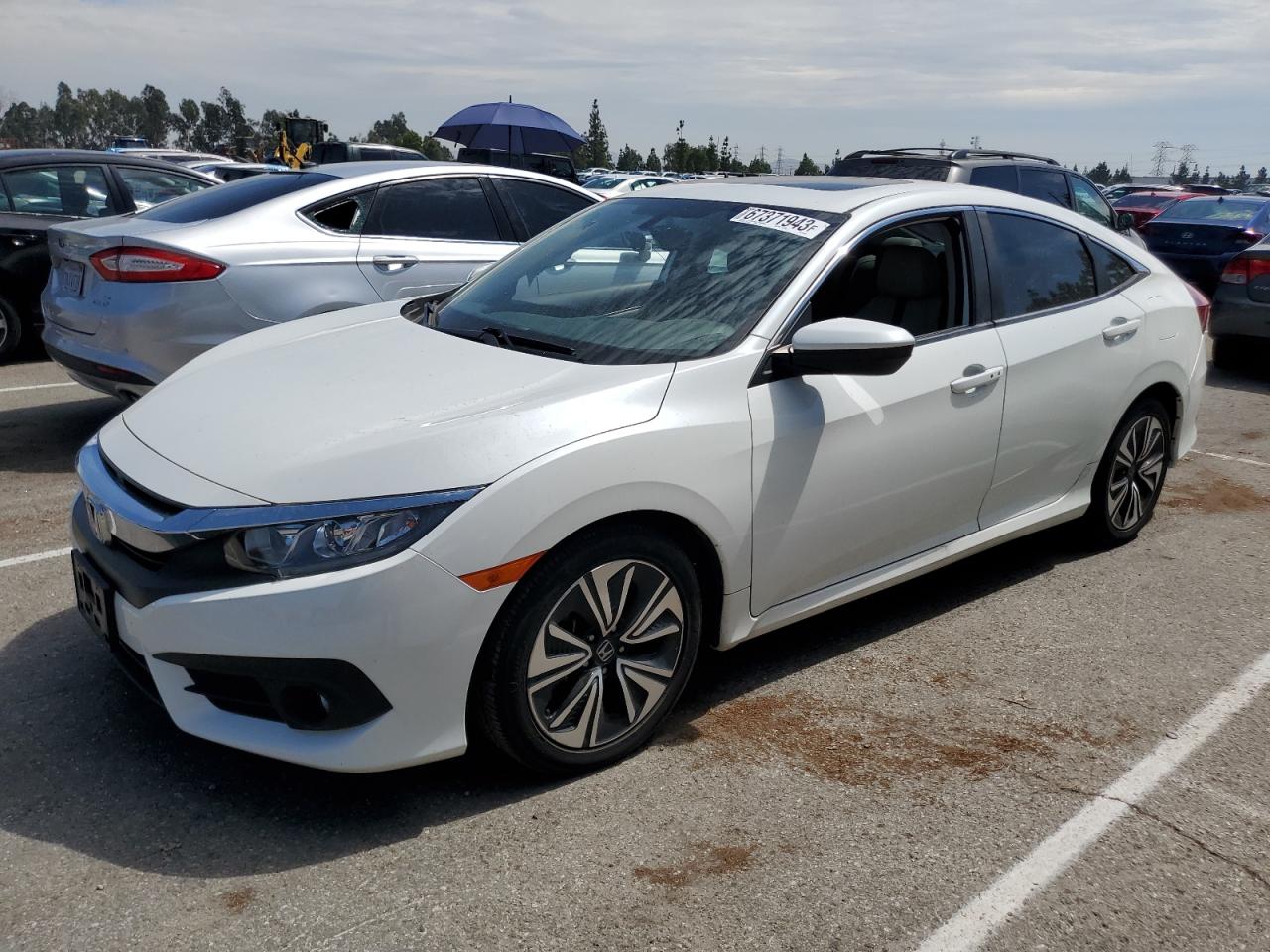 Image 1 of 2018 HONDA CIVIC EXL 2018 with VIN JHMFC1F75JX016455