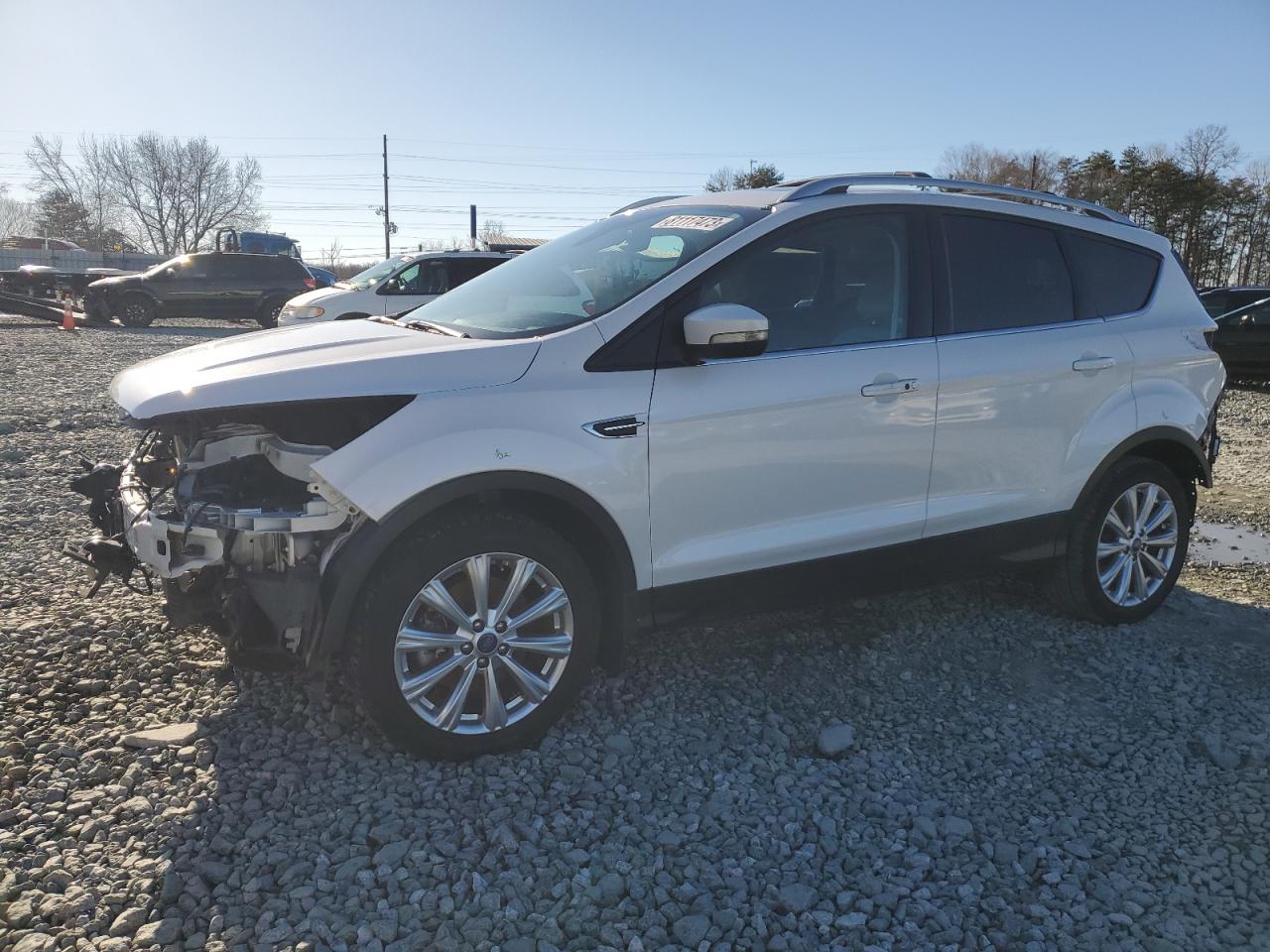 Image 1 of 2017 FORD ESCAPE TITANIUM 2017 with VIN 1FMCU0J92HUE32314