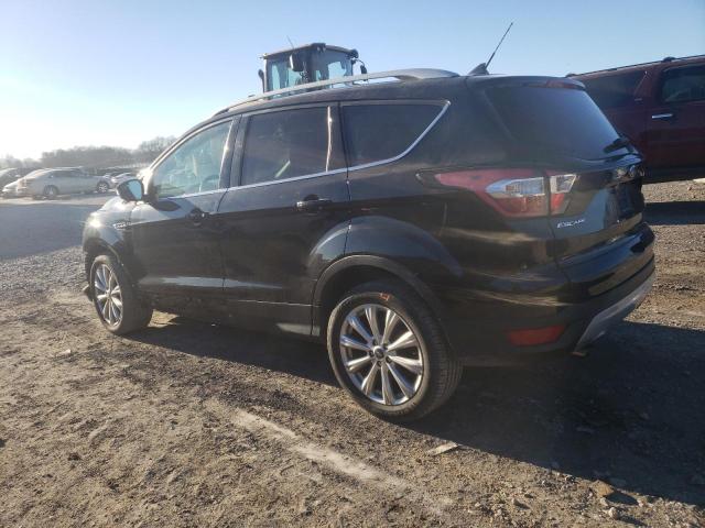 Изображение 2 2018 FORD ESCAPE TITANIUM 2018 с VIN 1FMCU9J90JUB74675