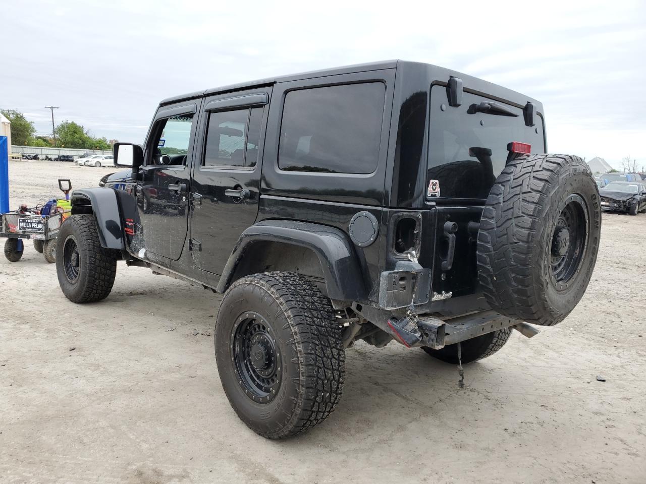 Image 2 of 2012 JEEP WRANGLER UNLIMITED SAHARA 2012 with VIN 1C4HJWEG0CL104743