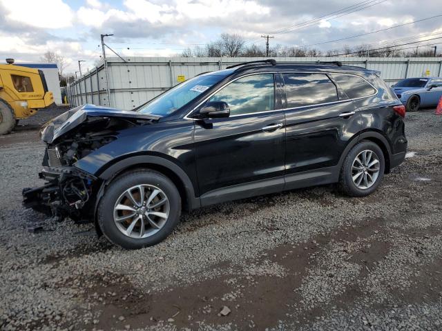 Image 1 of 2017 HYUNDAI SANTA FE SE 2017 with VIN KM8SNDHF5HU249940