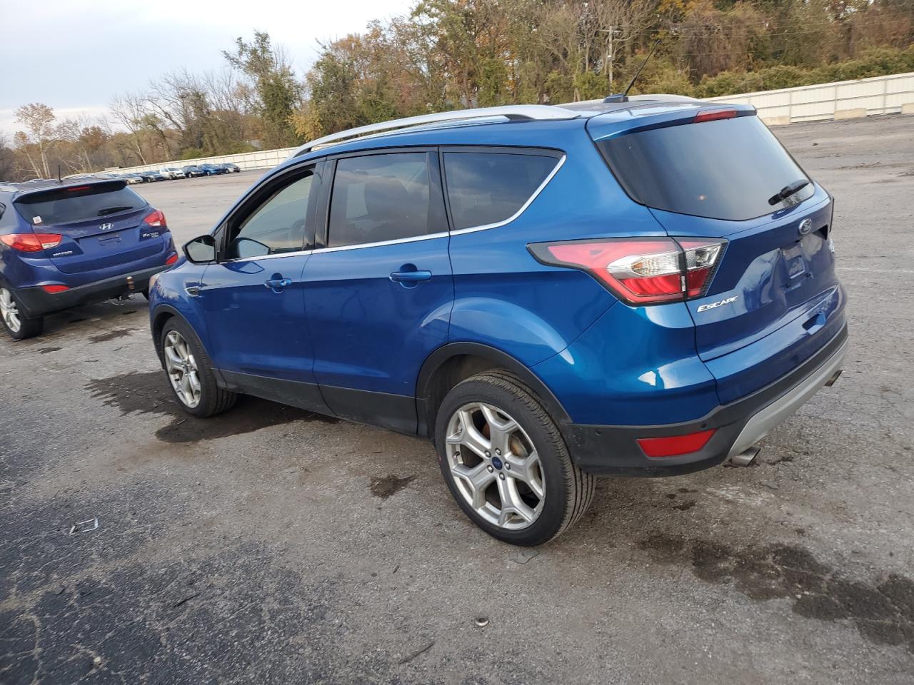 Obraz 2 z 2017 FORD ESCAPE TITANIUM 2017 z VIN 1FMCU9J91HUB33076