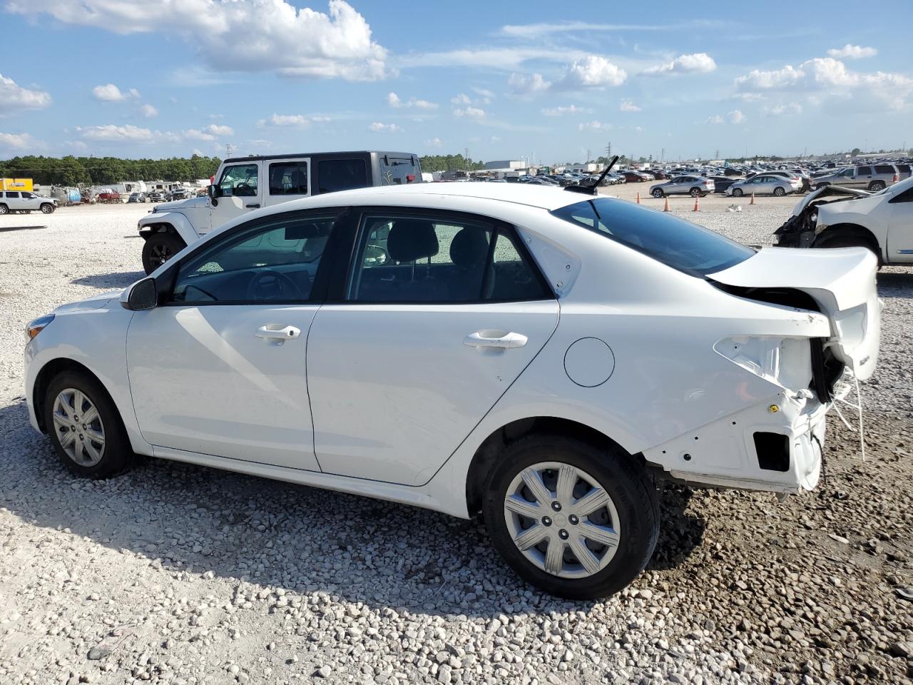 Изображение 2 2023 KIA RIO LX 2023 с VIN 3KPA24AD8PE574161