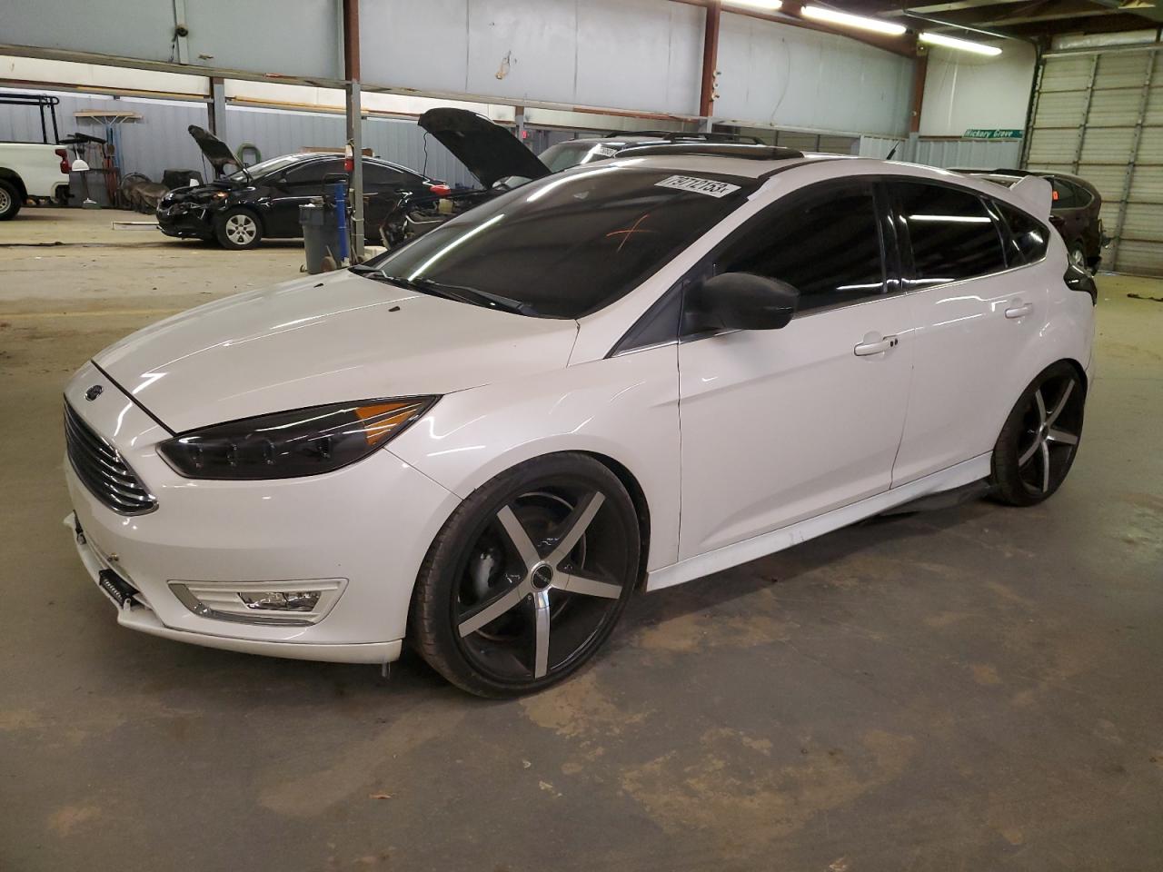 Obraz 1 z 2016 FORD FOCUS TITANIUM 2016 z VIN 1FADP3N24GL350125