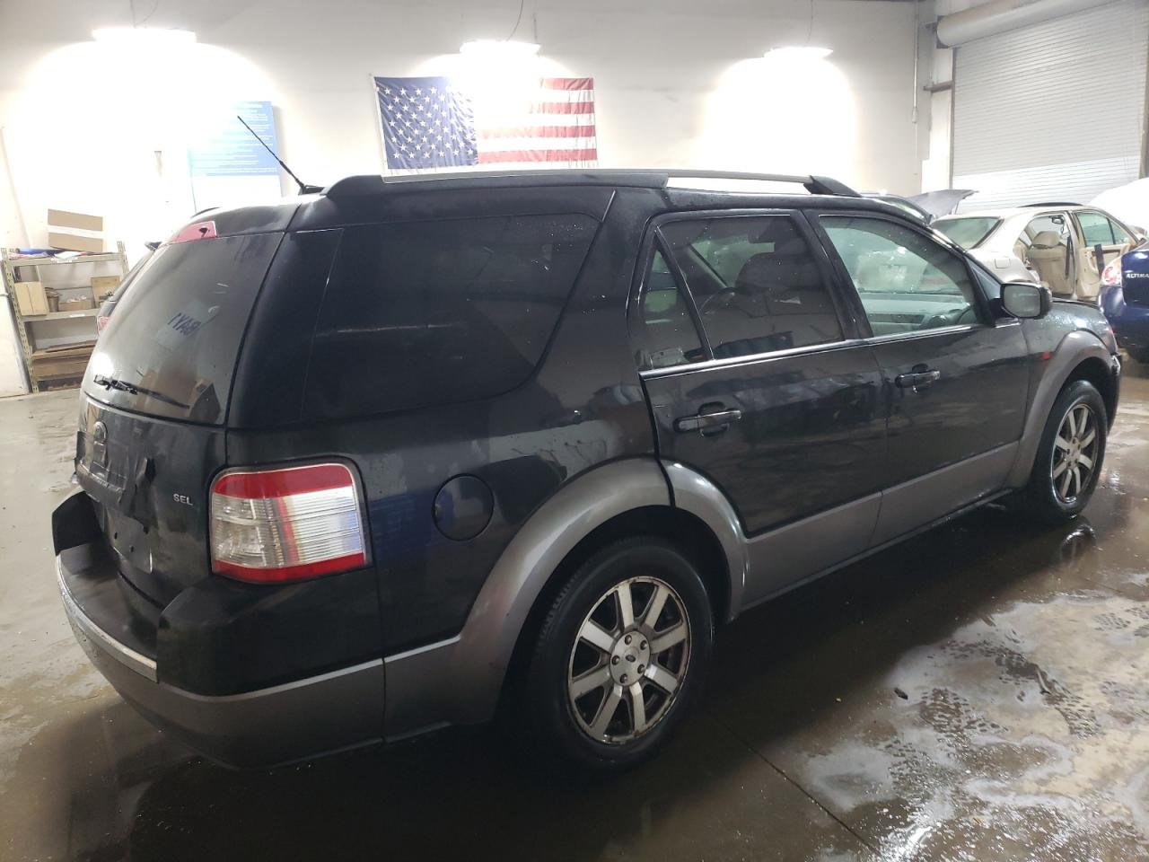 Изображение 3 2009 FORD TAURUS X SEL 2009 с VIN 1FMDK02WX9GA04926
