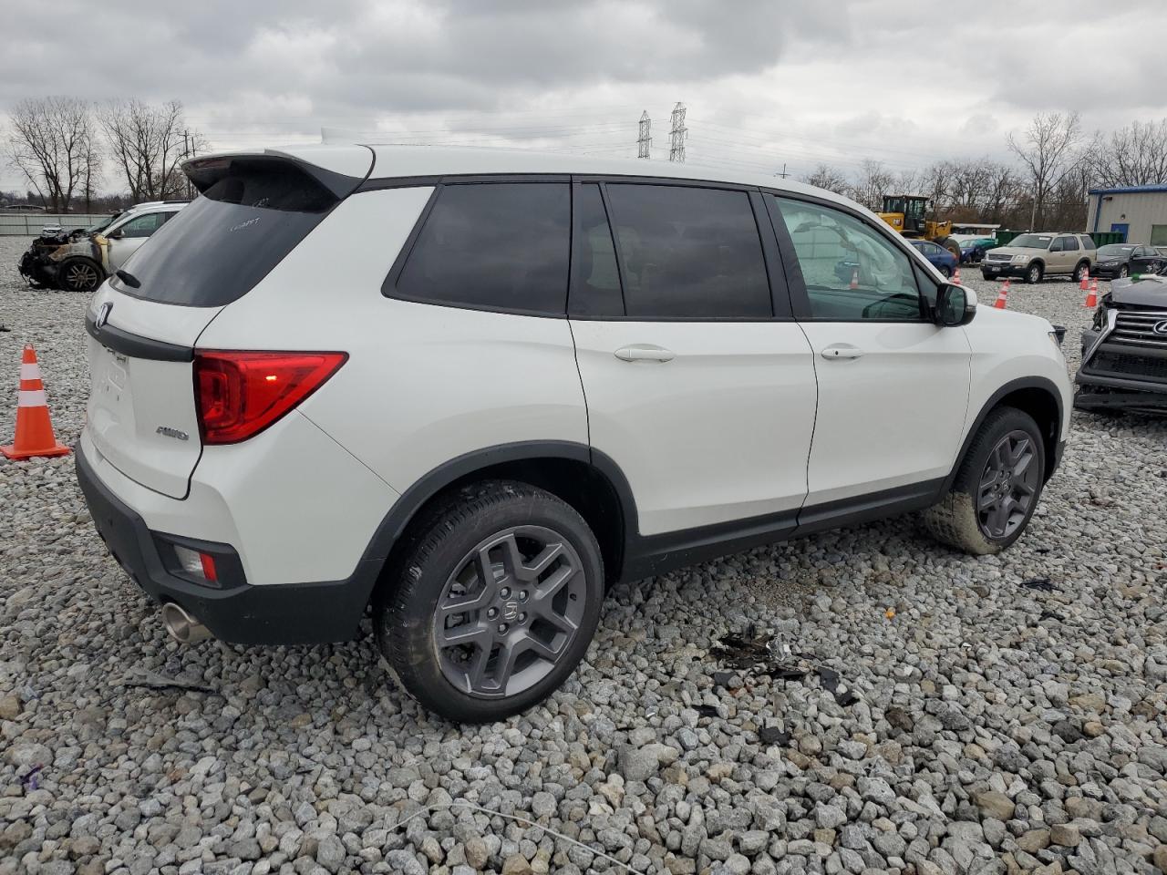 Image 3 of 2023 HONDA PASSPORT EXL 2023 with VIN 5FNYF8H57PB038885