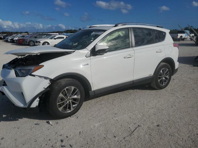 Image 1 of 2018 TOYOTA RAV4 HV LE 2018 with VIN JTMRJREV6JD182620