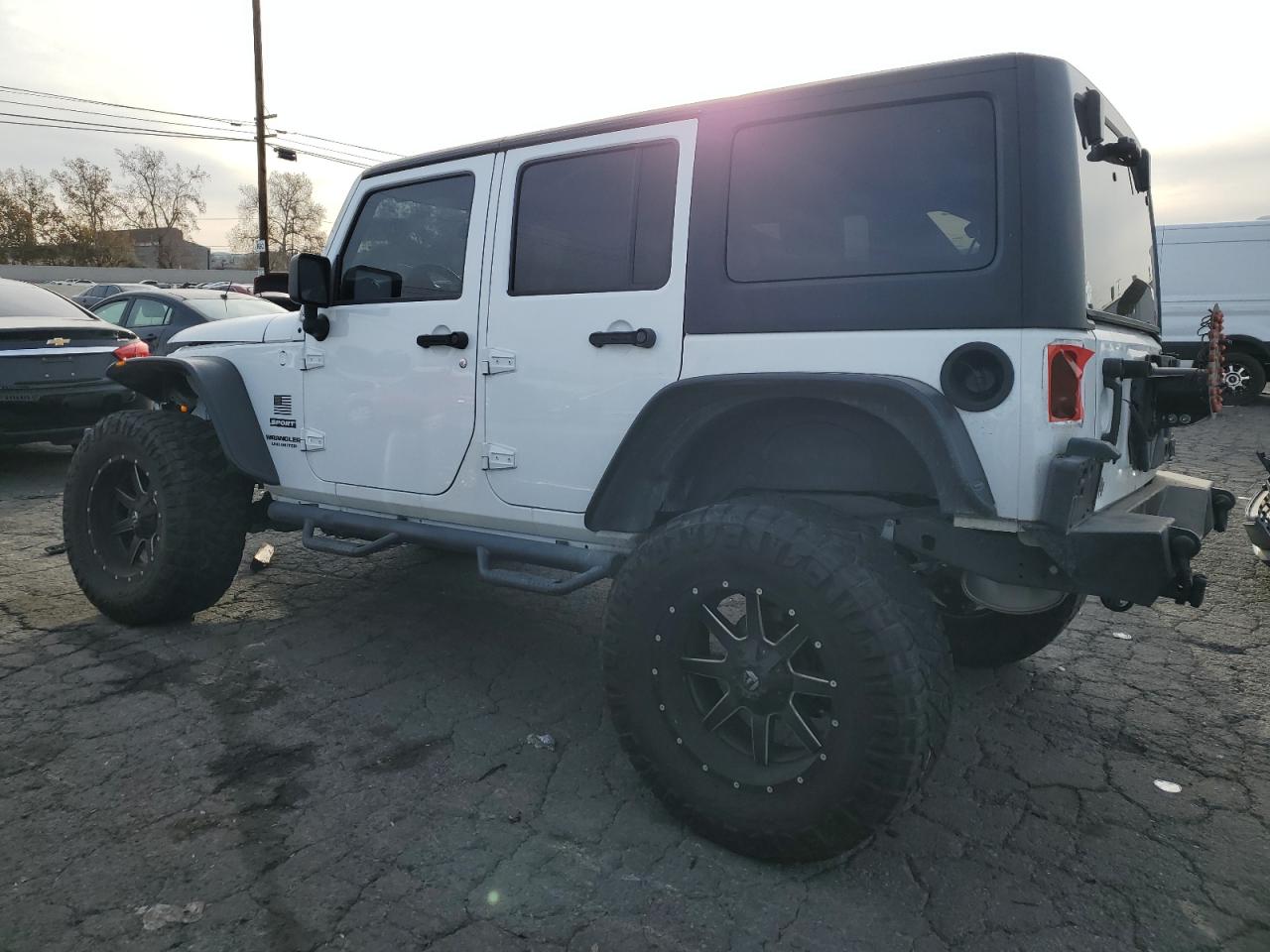Image 2 of 2015 JEEP WRANGLER UNLIMITED SPORT 2015 with VIN 1C4BJWDG0FL536860
