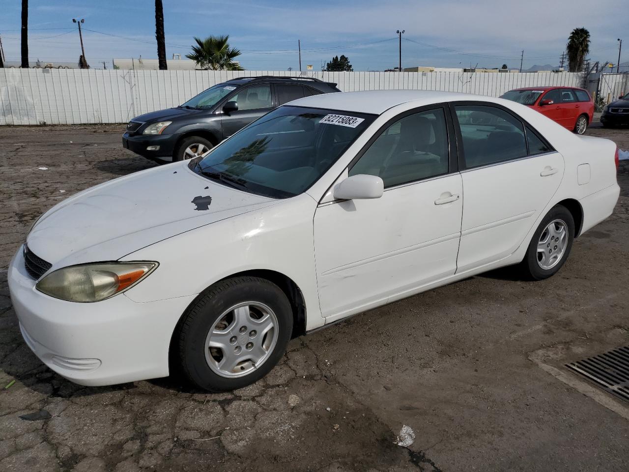 Obraz 1 z 2002 TOYOTA CAMRY LE 2002 z VIN 4T1BF32K82U007311