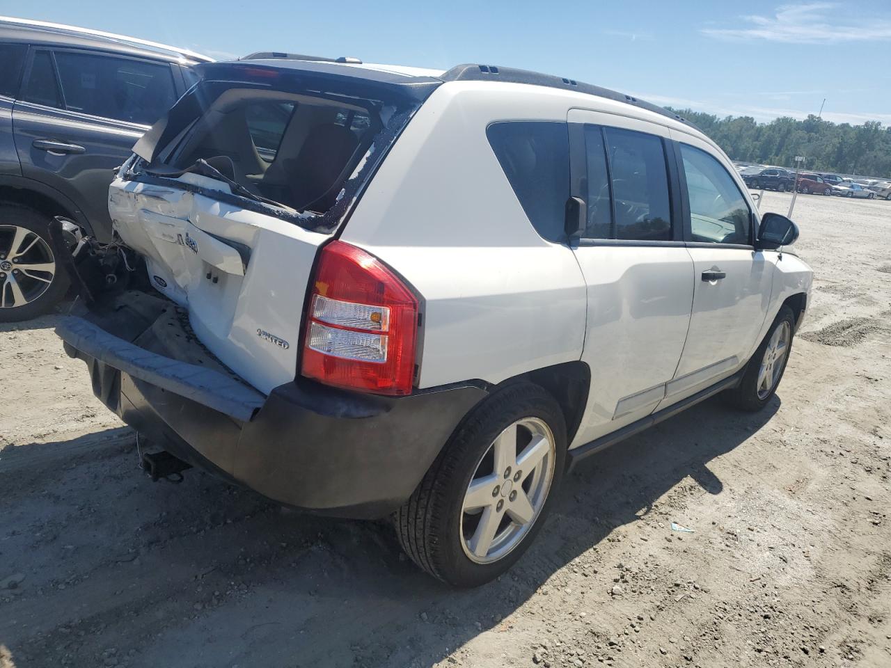Image 3 of 2009 JEEP COMPASS LIMITED 2009 with VIN 1J4FT57B19D137664
