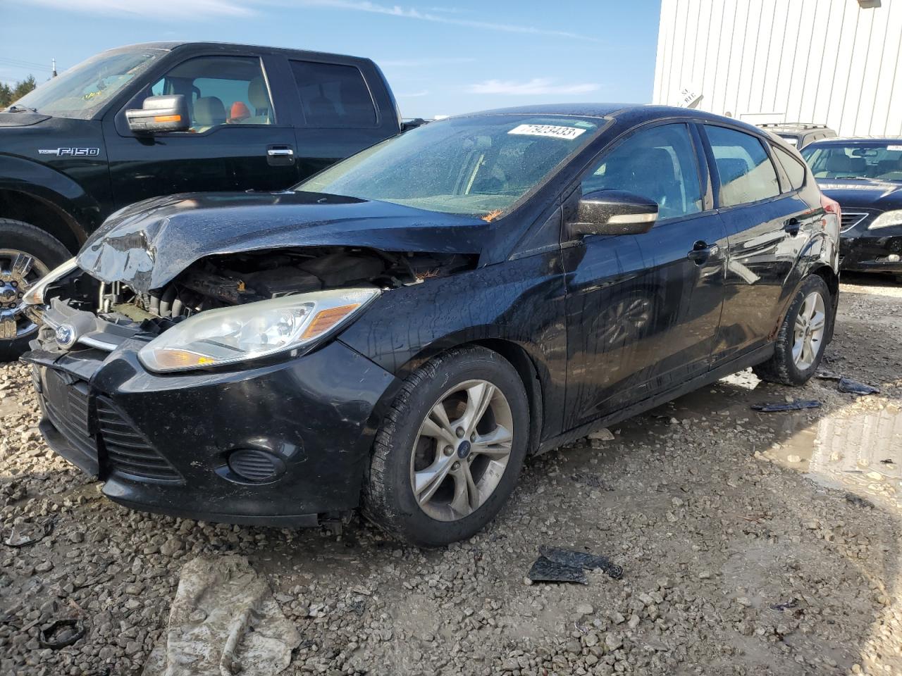 Image 1 of 2014 FORD FOCUS SE 2014 with VIN 1FADP3K29EL213876