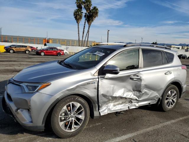 Image 1 of 2018 TOYOTA RAV4 HV LE 2018 with VIN JTMRJREV1JD157611
