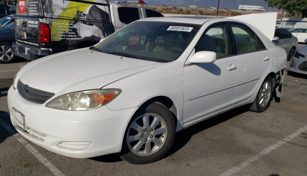 Image 1 of 2002 TOYOTA CAMRY LE 2002 with VIN JTDBE32K220057068