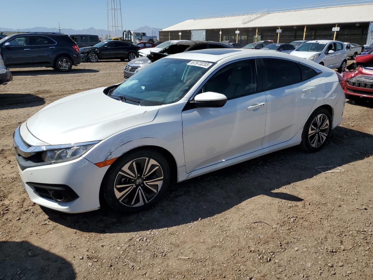 Image 1 of 2018 HONDA CIVIC EX 2018 with VIN 19XFC1E35JE001079