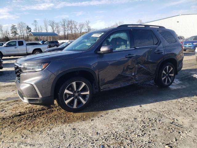 Изображение 1 2023 HONDA PILOT TOURING 2023 с VIN 5FNYG2H77PB003193