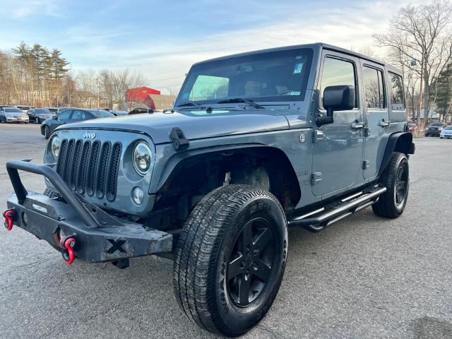 Obraz 2 z 2015 JEEP WRANGLER UNLIMITED SPORT 2015 z VIN 1C4BJWDG2FL521969