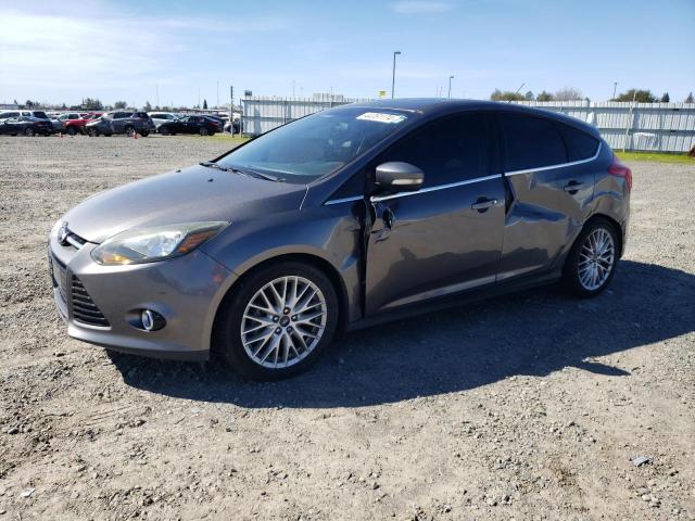 Image 1 of 2014 FORD FOCUS TITANIUM 2014 with VIN 1FADP3N21EL118918