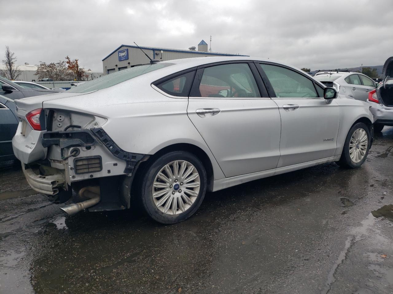 Image 3 of 2016 FORD FUSION SE HYBRID 2016 with VIN 3FA6P0LU4GR283457