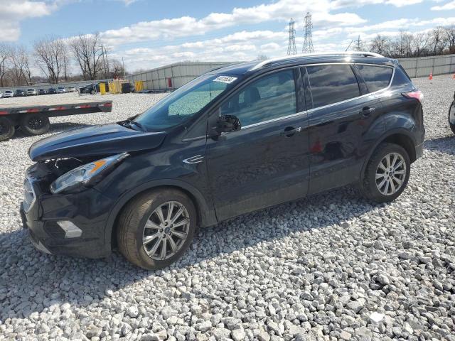 Image 1 of 2017 FORD ESCAPE TITANIUM 2017 with VIN 1FMCU0J94HUC82402