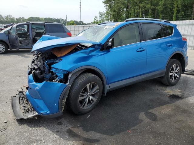 Image 1 of 2017 TOYOTA RAV4 XLE 2017 with VIN JTMWFREV6HJ716747