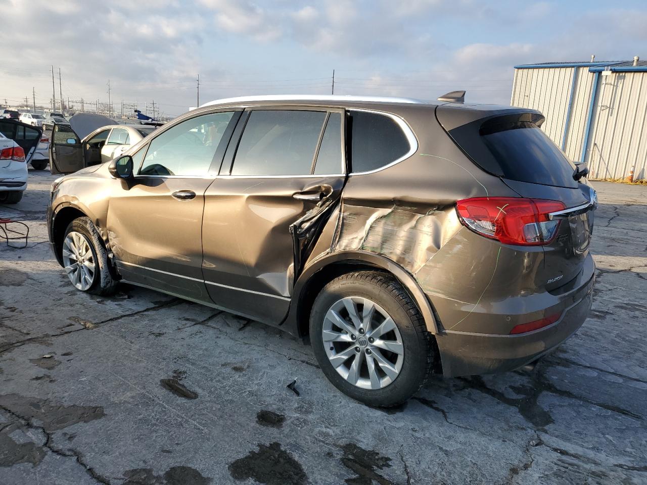 Изображение 2 2017 BUICK ENVISION ESSENCE 2017 с VIN LRBFXBSA5HD026202