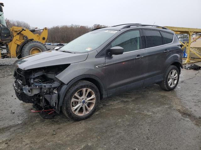 Obraz 1 z 2017 FORD ESCAPE SE 2017 z VIN 1FMCU9GD0HUD33314