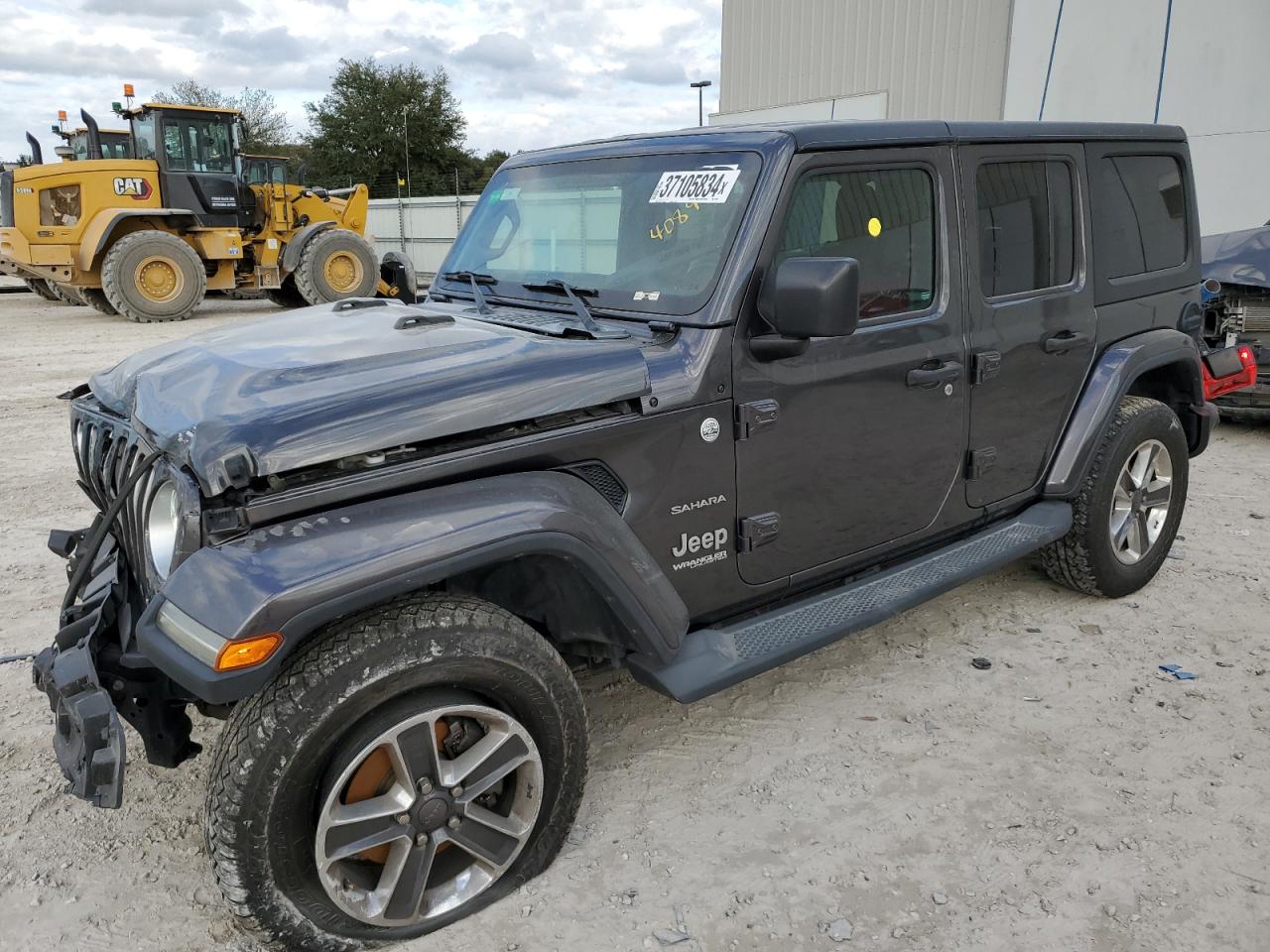 Image 1 of 2019 JEEP WRANGLER UNLIMITED SAHARA 2019 with VIN 1C4HJXEG0KW571857