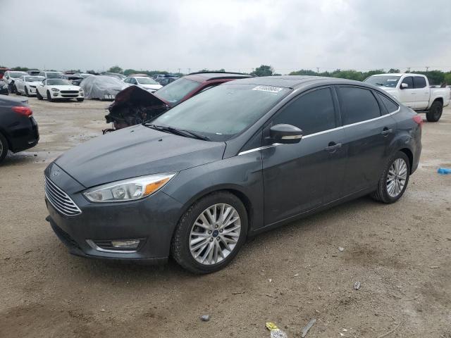 Image 1 of 2017 FORD FOCUS TITANIUM 2017 with VIN 1FADP3J23HL277398