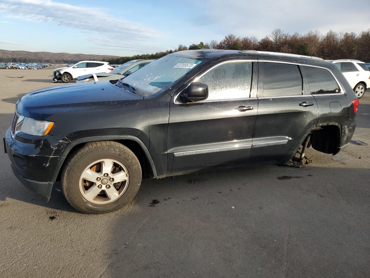 Image 1 of 2012 JEEP GRAND CHEROKEE LAREDO 2012 with VIN 1C4RJFAG1CC155114