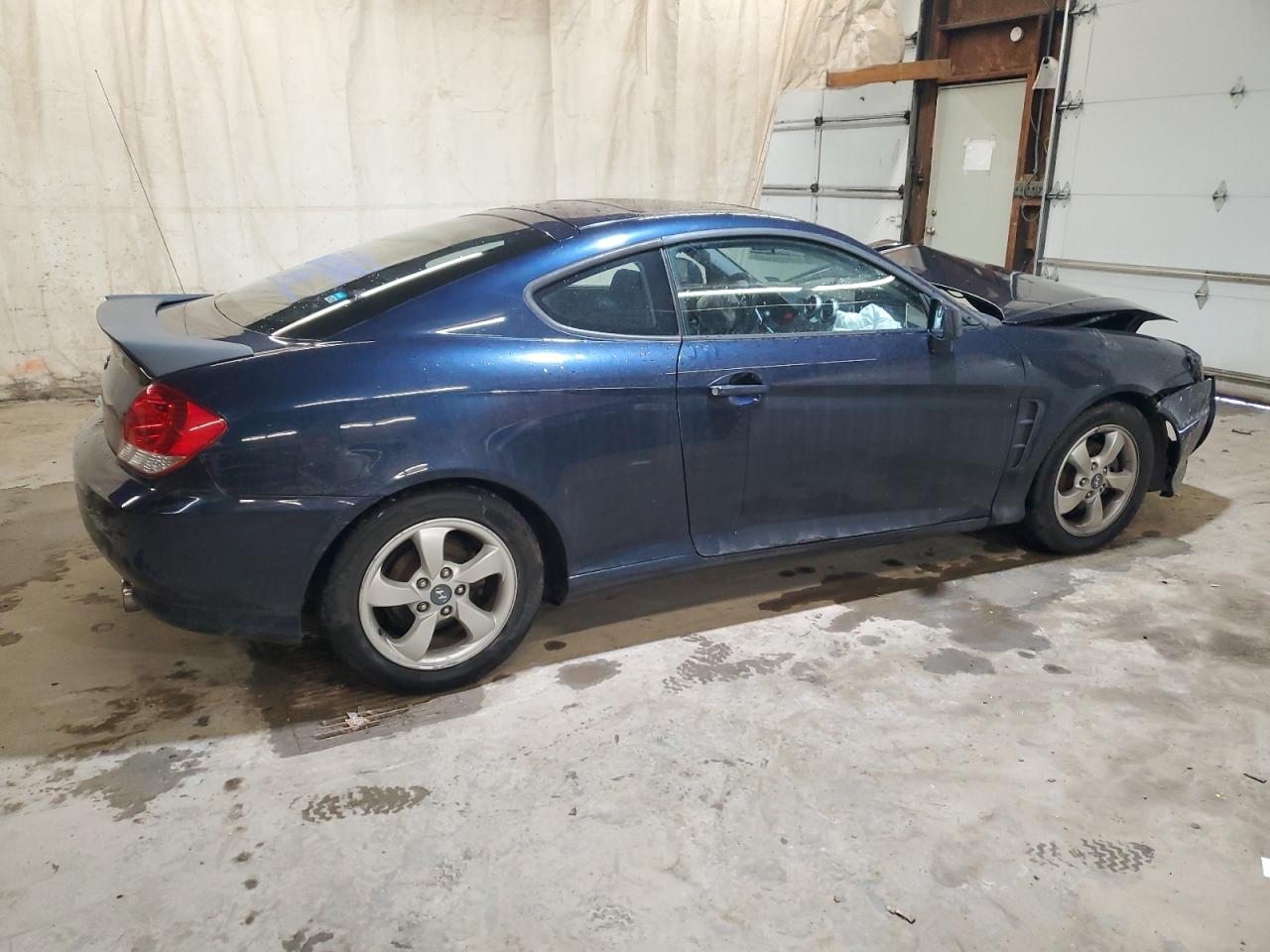Obraz 3 z 2005 HYUNDAI TIBURON  2005 z VIN KMHHM65DX5U166396