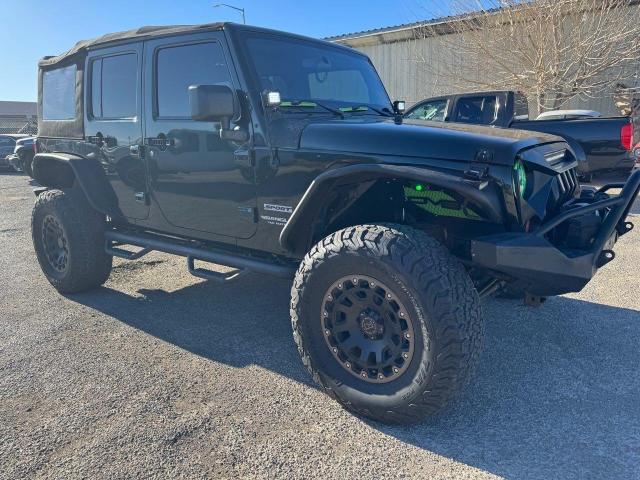 Изображение 1 Jeep Wrangler Unlimited Sport 2012 с VIN 1C4BJWDG0CL101137
