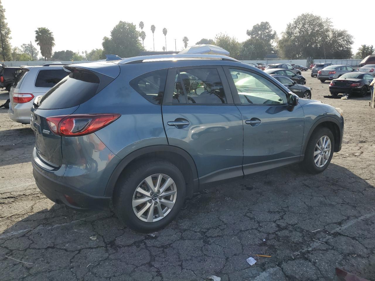 Изображение 3 2015 MAZDA CX-5 TOURING 2015 с VIN JM3KE2CYXF0476344