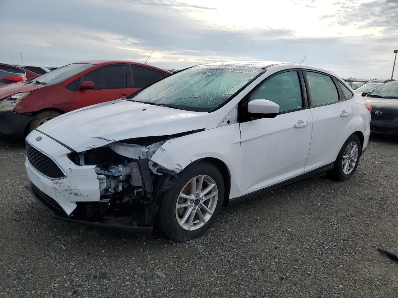 Image 1 of 2018 FORD FOCUS SE 2018 with VIN 1FADP3FE7JL323033