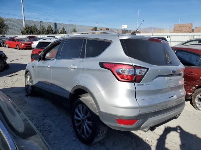 Изображение 2 2018 FORD ESCAPE TITANIUM 2018 с VIN 1FMCU0J94JUD05411