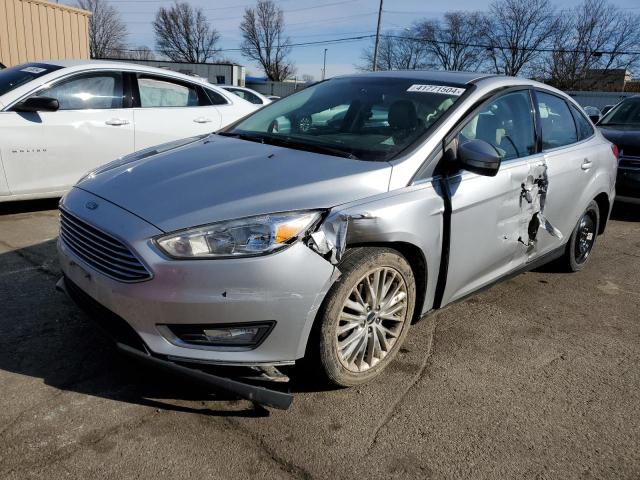 Image 1 of 2017 FORD FOCUS TITANIUM 2017 with VIN 1FADP3J24HL287499