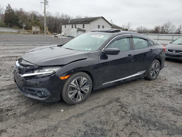 Obraz 1 z 2017 HONDA CIVIC EX 2017 z VIN 19XFC1E35HE024095