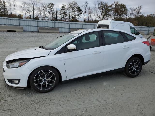 Obraz 1 z 2017 FORD FOCUS SEL 2017 z VIN 1FADP3H20HL262086