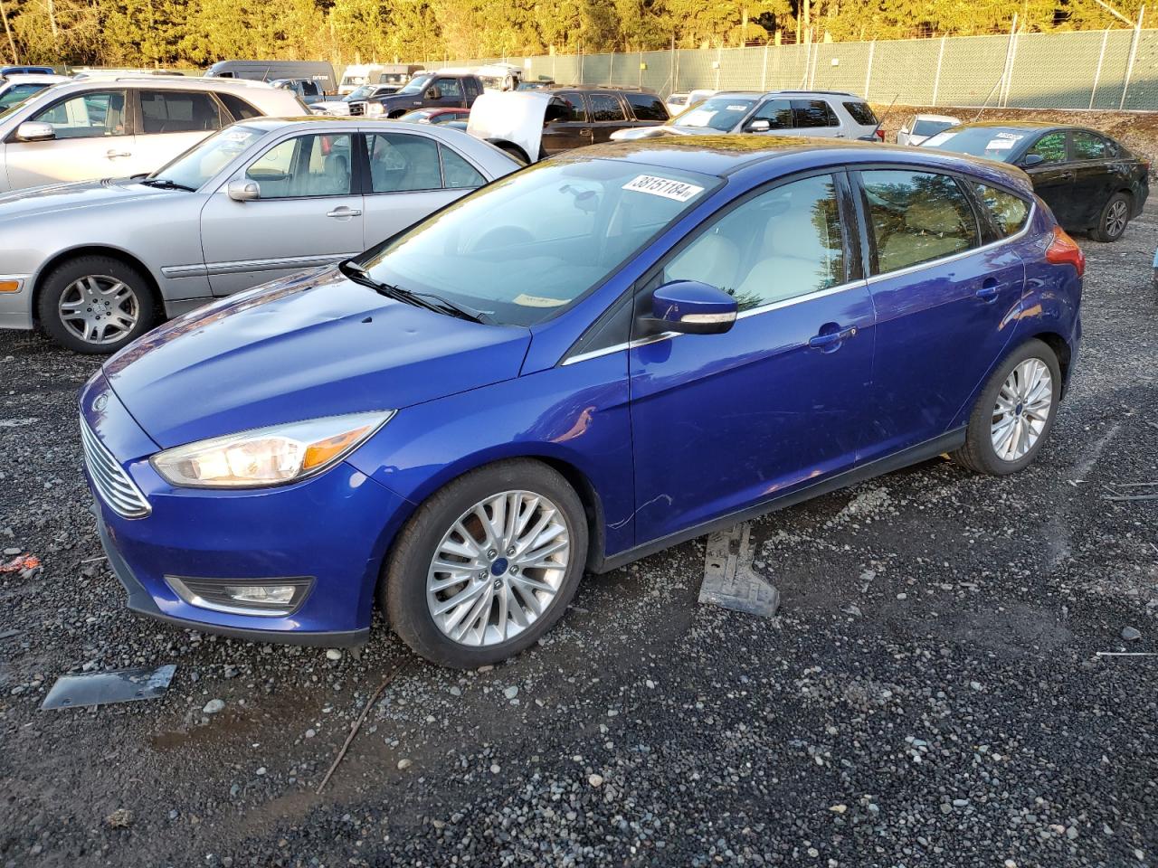 Image 1 of 2015 FORD FOCUS TITANIUM 2015 with VIN 1FADP3N21FL364224