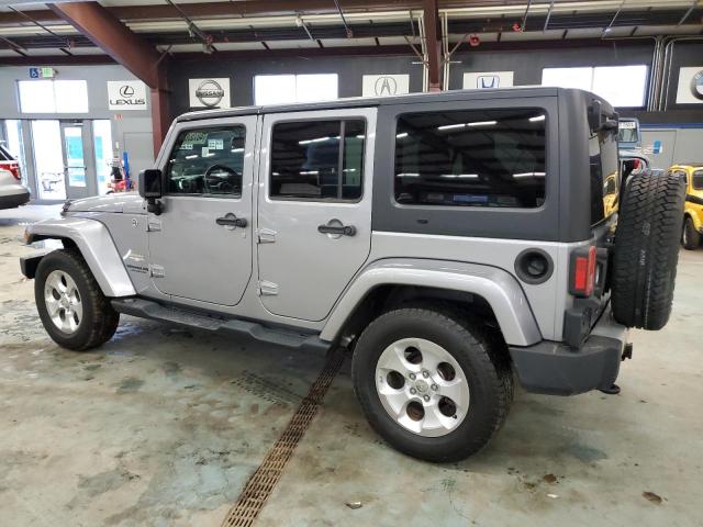 Image 2 of 2014 JEEP WRANGLER UNLIMITED SAHARA 2014 with VIN 1C4HJWEG7EL136219