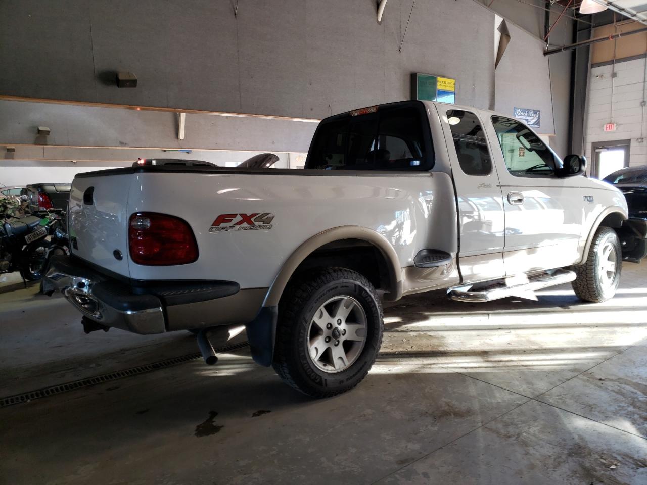 Obraz 3 z 2003 FORD F150  2003 z VIN 2FTRX08L13CA56401