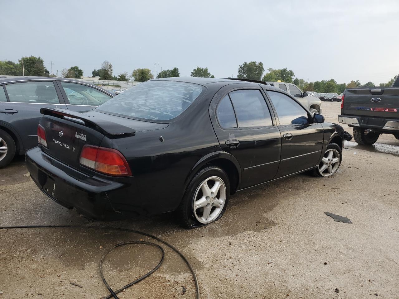 Image 3 of 1997 NISSAN MAXIMA GLE 1997 with VIN JN1CA21D9VM517596
