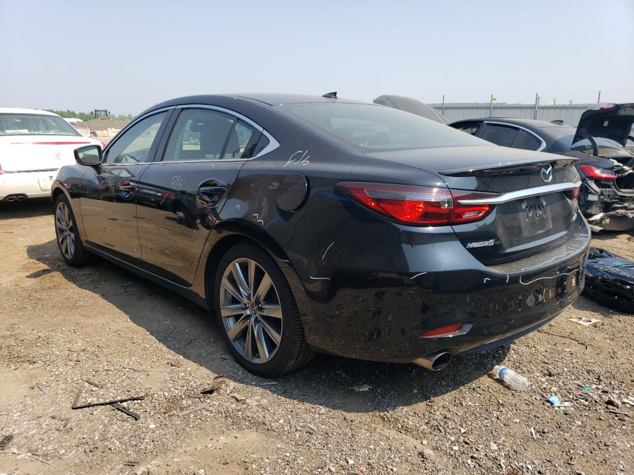 Изображение 2 Mazda 6 Grand Touring Reserve 2018 с VIN JM1GL1WY9J1300463