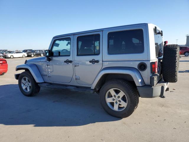 Изображение 2 2013 JEEP WRANGLER UNLIMITED SAHARA 2013 с VIN 1C4HJWEG7DL667077