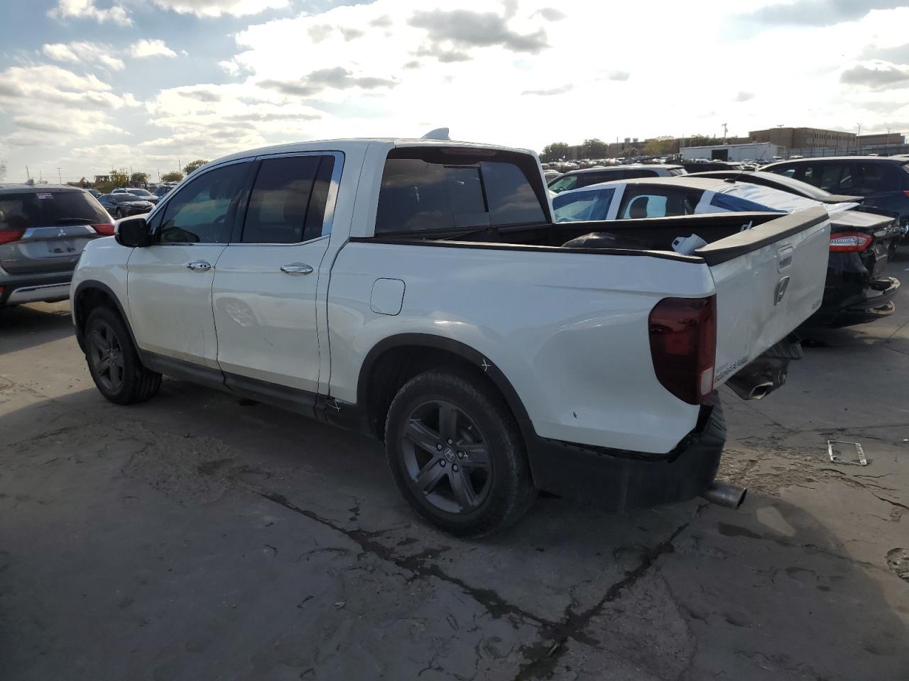 Изображение 2 Honda Ridgeline Rtl 2022 с VIN 5FPYK3F70NB009090