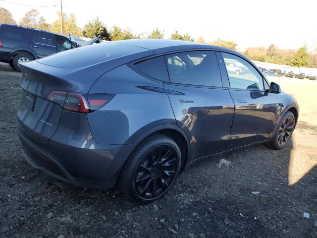 Obraz 3 z 2023 TESLA MODEL Y  2023 z VIN 7SAYGDEE7PF857439