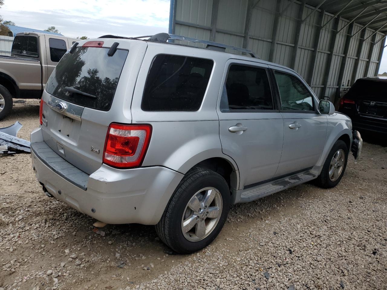 Image 3 of 2010 FORD ESCAPE LIMITED 2010 with VIN 1FMCU0EG4AKA95235