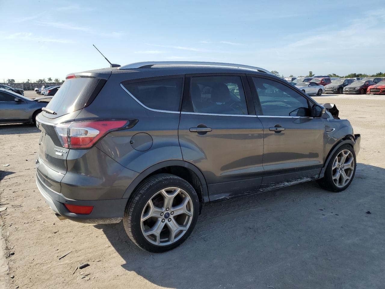 Image 3 of 2017 FORD ESCAPE TITANIUM 2017 with VIN 1FMCU0JD9HUA31444