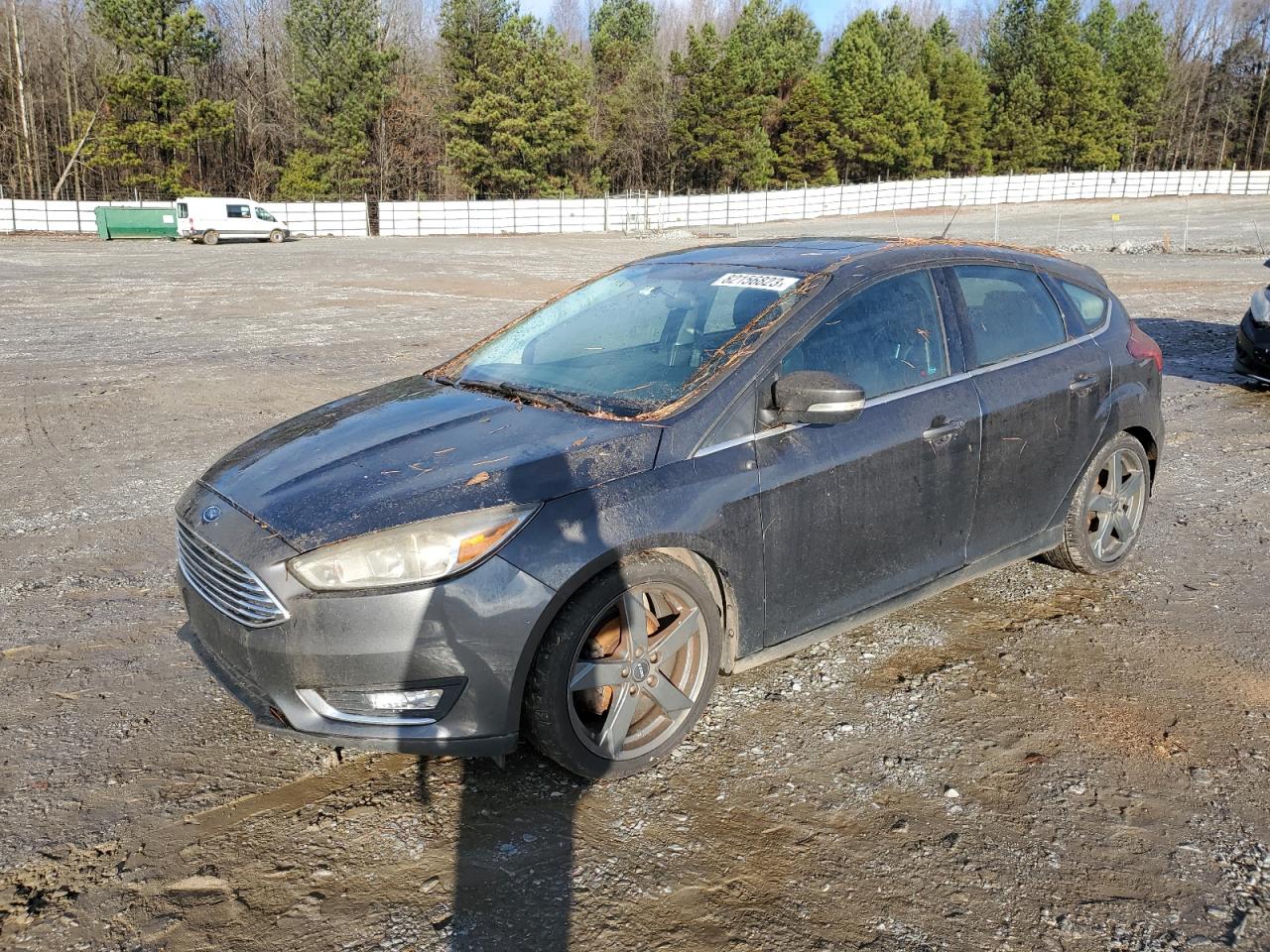 Image 1 of 2016 FORD FOCUS TITANIUM 2016 with VIN 1FADP3N23GL374805