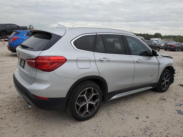 Obraz 3 z 2018 BMW X1 SDRIVE28I 2018 z VIN WBXHU7C37J5H40452